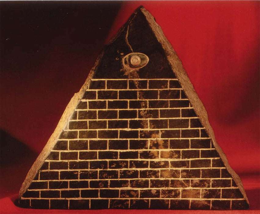 La mana artifact: The triangular stone with thirteen layers and and an eye above it.